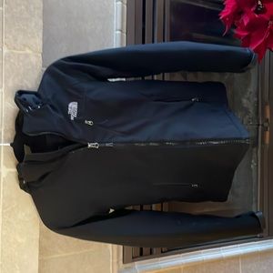 The North Face primaloft jacket. Black with hood size small